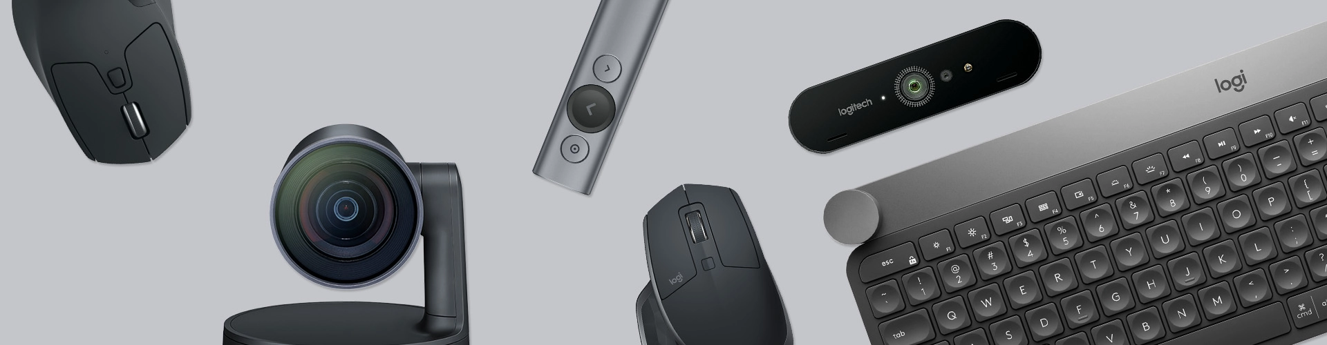 Logitech Tastatur, Kameras und Mäuse auf grauen Hintergrund